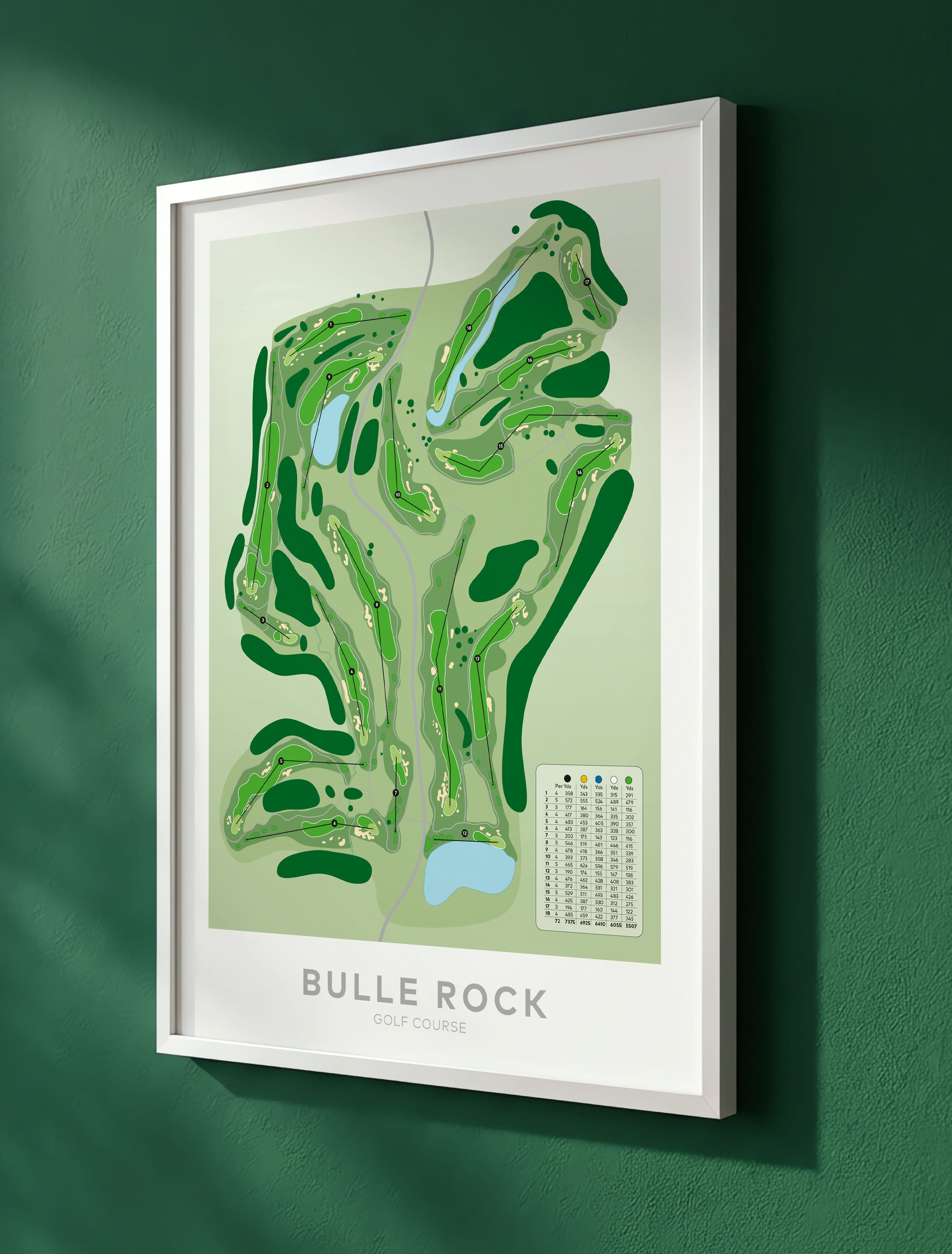 A framed golf course map print of Bulle Rock Golf Course, featuring a stylized green layout with a small course legend in the lower right, mounted on a dark green wall.